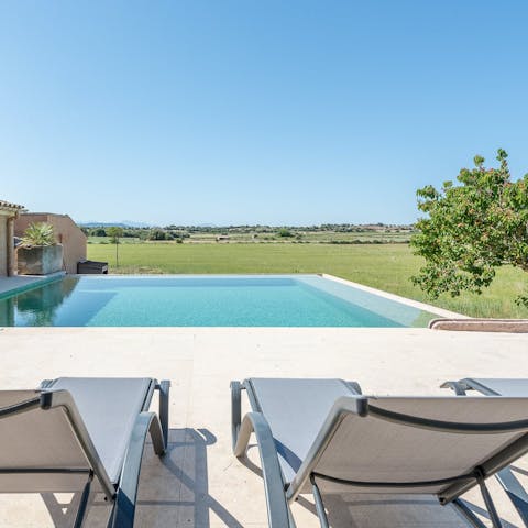 Enjoy countryside views from the poolside terrace