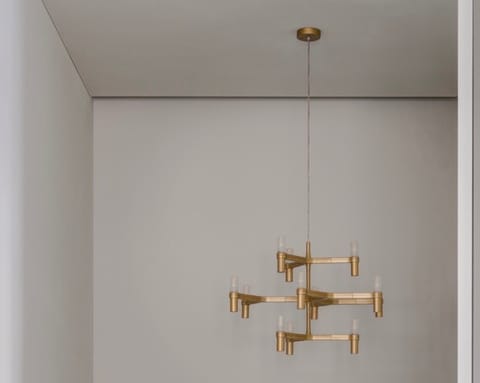 This eye-catching brass chandelier