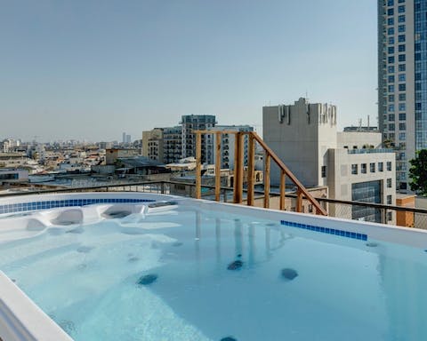 Unwind in the private swim spa on the rooftop