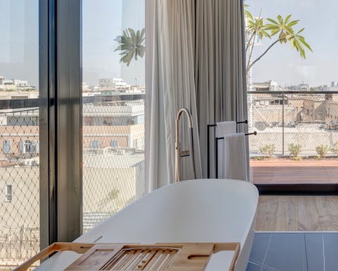 Enjoy a bath with a view in the huge master bathroom