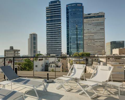 Hang out on the rooftop terrace with a skyscraper panorama