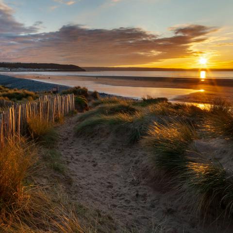 Watch the sunset at Westward Ho! Beach, just a five-minute drive from home