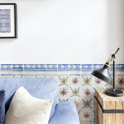 Admire the original azulejo tiles