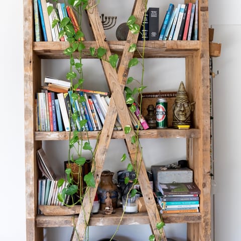 Grab a book from the handmade shelves