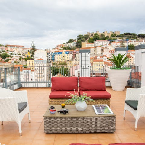 Admire the views of São Jorge Castle from the terrace