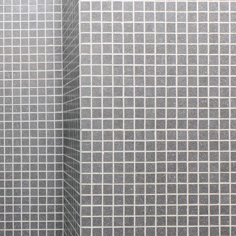 Slate-grey bathroom tiles