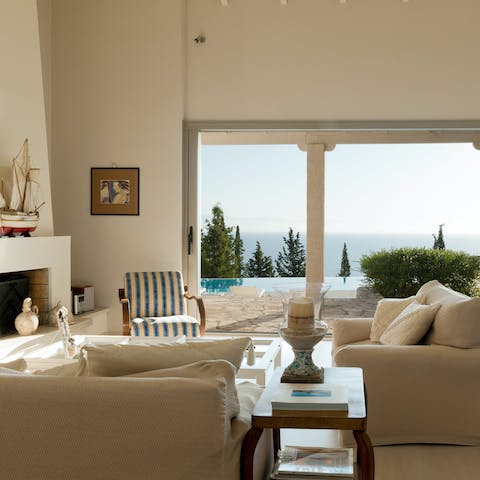 Curl up with a good book in the elegant lounge, those sea views will be right there with you