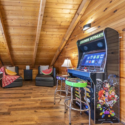 Blow off some steam with an arcade game or two in the loft