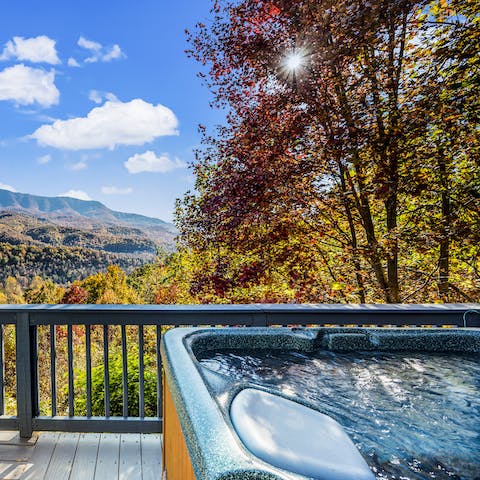 Gaze out at the Great Smoky Mountains from your private hot tub