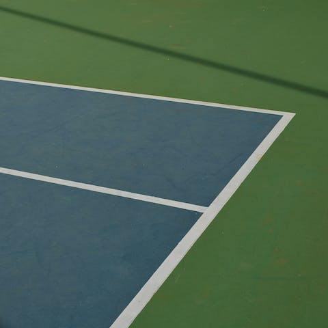 Unleash your inner McEnroe on the on-site tennis court