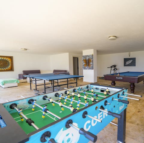 Play table tennis, pool, table football or air hockey in the games room
