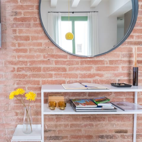 Take in the home's rustic features and exposed brick wall 