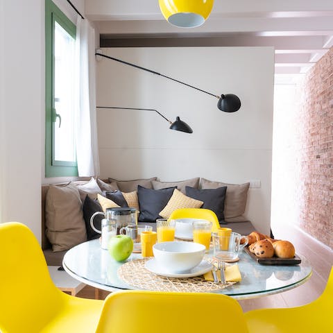 Come together for coffee and churros in the vibrant yellow dining area