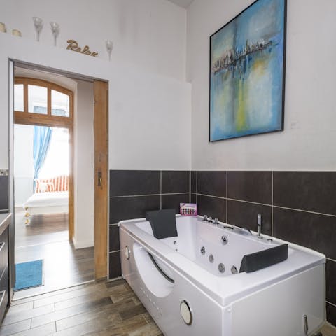 The jacuzzi in the bathroom