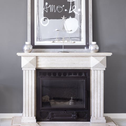 Snuggle up in front of the beautiful fireplace on chilly evenings