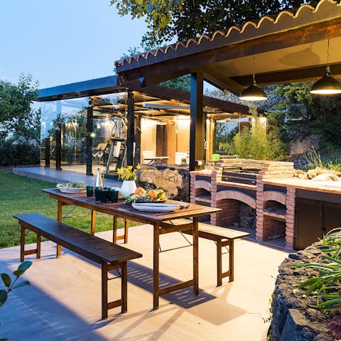 Enjoy balmy evenings barbecuing in the outdoor kitchen