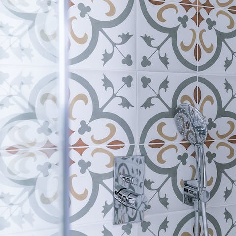 The patterned bathroom tiles