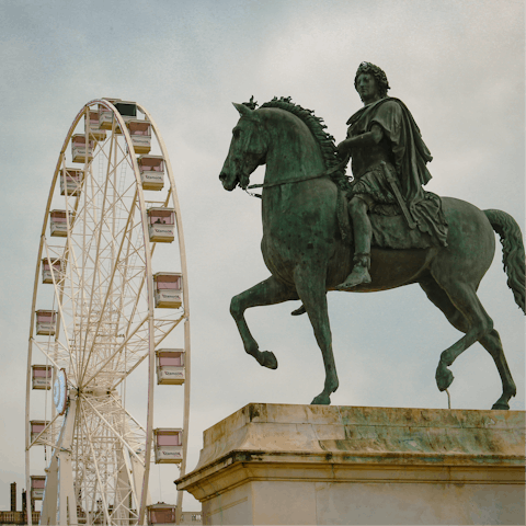 Visit bustling Place Bellecour, a short walk from your home