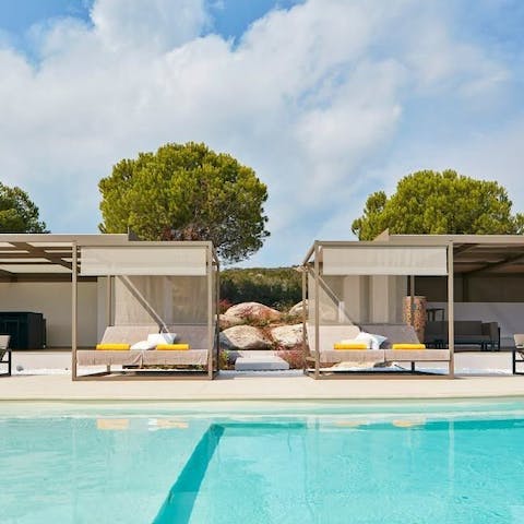 Bag a double day bed by the poolside and while away sunny afternoons