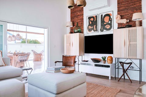 Snuggle up in front of the flat screen TV for a movie night on chillier evenings