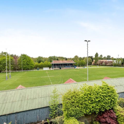 Watch university rugby teams play on the neighbouring pitch from the balcony