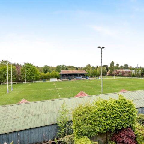 Watch university rugby teams play on the neighbouring pitch from the balcony