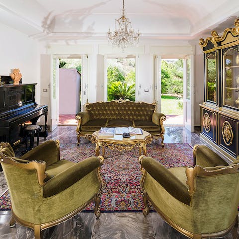 Play a tune on the piano as your loved ones relax in the elegant living space
