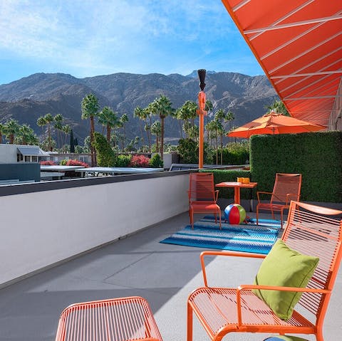 Sunbathe on your private balcony with views of the San Jacinto Mountains