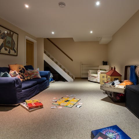 Cosy up for movie nights in the games den room