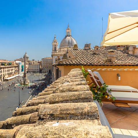 People-watch on buzzing Piazza Navona from the privacy of your terrace