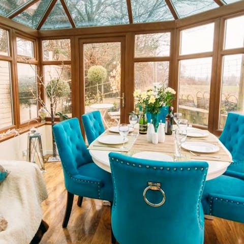 Dine in the chic conservatory and enjoy surrounding views of the gardens