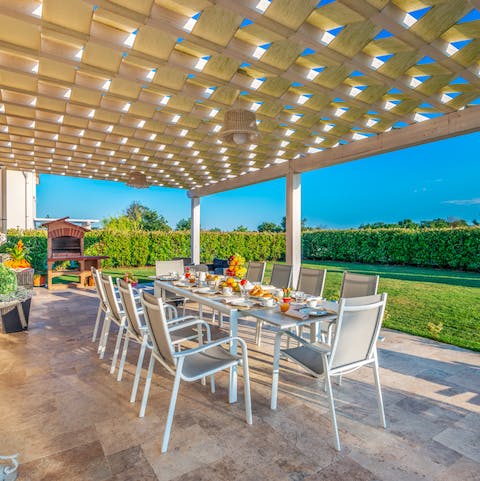 Gather beneath the shady pergola for family dinners of barbecued local produce, washed down with local wine