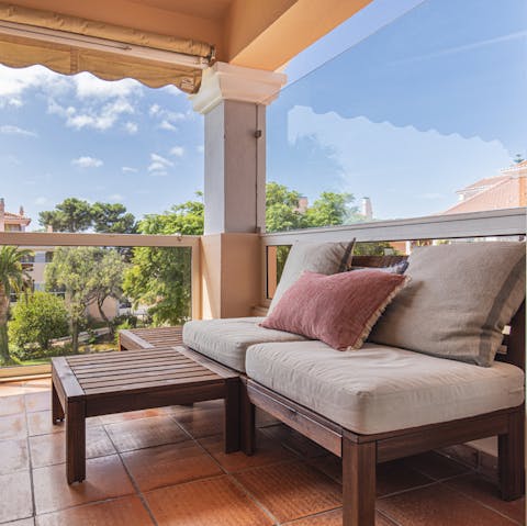 Relax with a glass of Portuguese wine on your private balcony