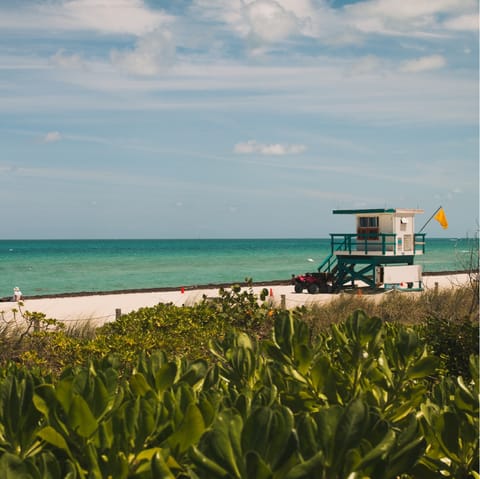 Stay on Collins Avenue, just a block away from the beach