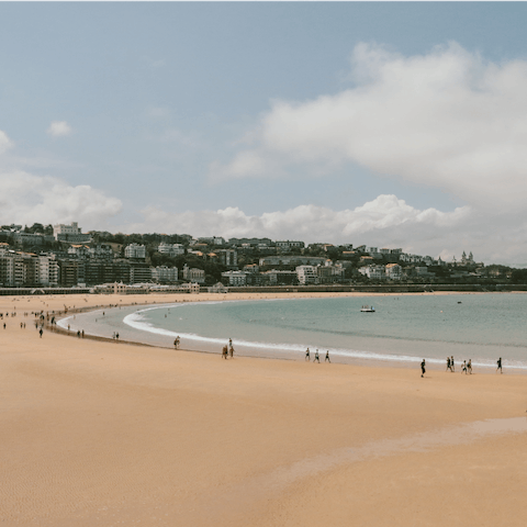 Stroll along the golden sands of La Concha, just 350m away