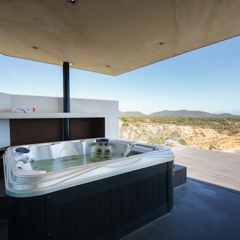 Sink into the hot tub on the upper terrace with a glass of rosé