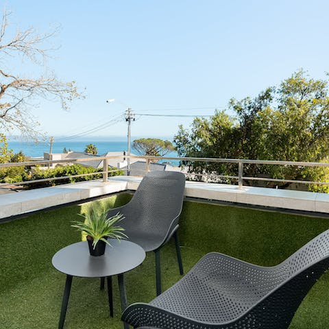 Start mornings with a coffee on the rooftop terrace boasting sea views