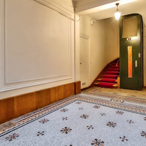 Enter the building in style, across the decoratively tiled flooring
