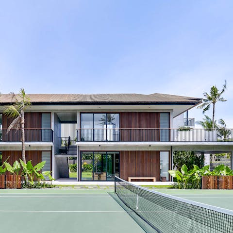 Embrace competitive fun with games of tennis on the private court