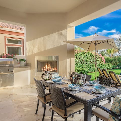 Make the most of the covered terrace complete with a gas grill and fireplace – the perfect spot for some alfresco dining 