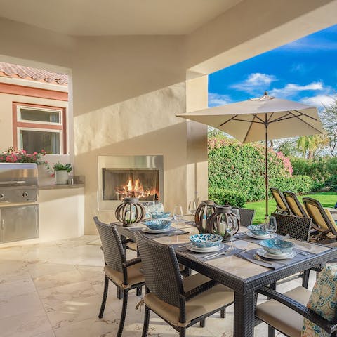 Make the most of the covered terrace complete with a gas grill and fireplace – the perfect spot for some alfresco dining