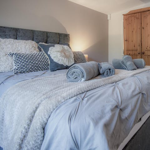 Treat yourself to a long lie-in in the cosy master bedroom