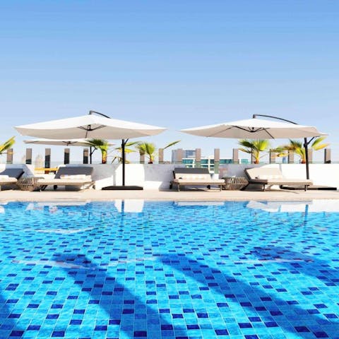 Head up to the rooftop pool terrace to soak up the desert sun