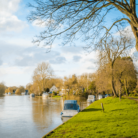 Watch the boats pootle along the River Thames, a two-minute walk from your doorstep