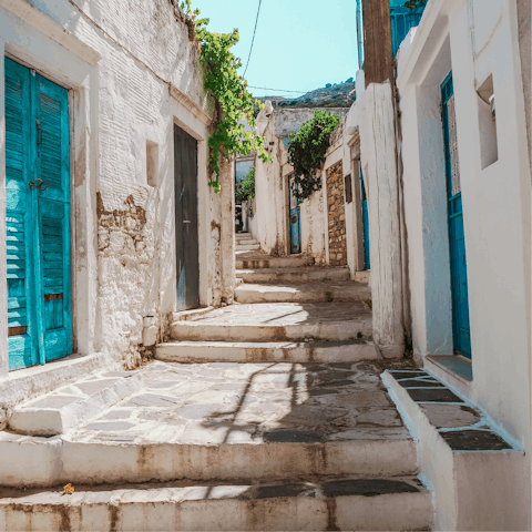 Drive seven-minutes into Naxos Town and walk the cobbled streets
