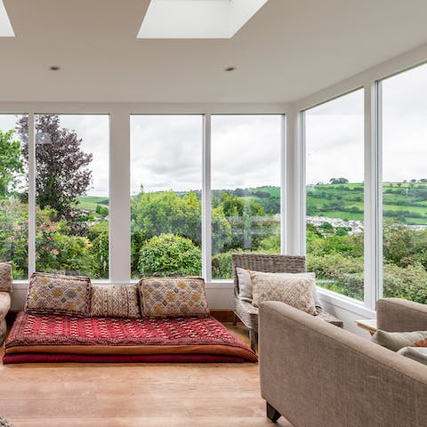 Relax in the sun room and enjoy the incredible views on offer