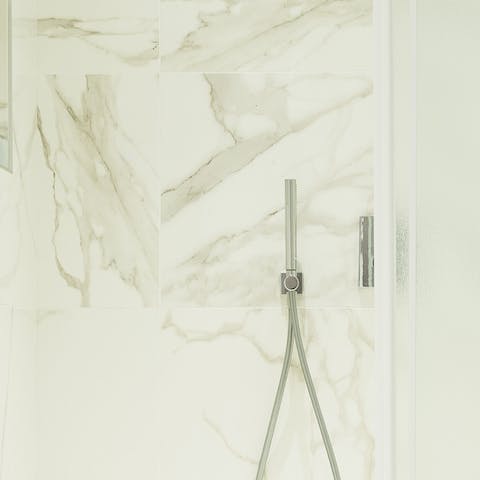 The marble-clad rainfall shower