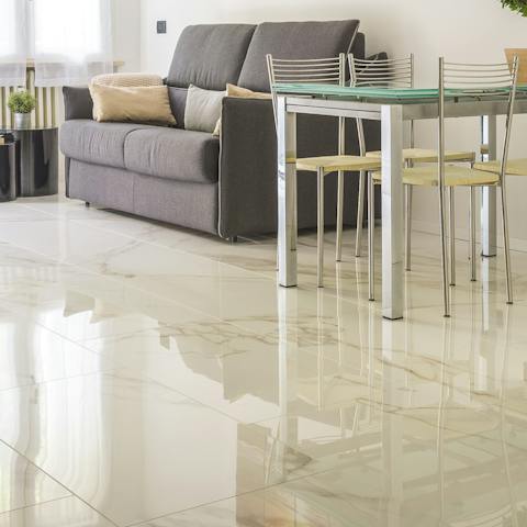 The polished marble floors