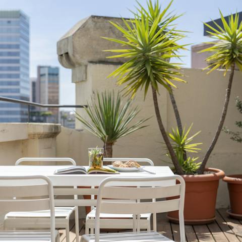 Soak up the sun on the large terrace complete with resplendent views