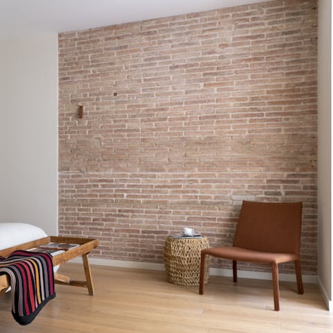Pull up a chair and chill out in front of the exposed brick walls